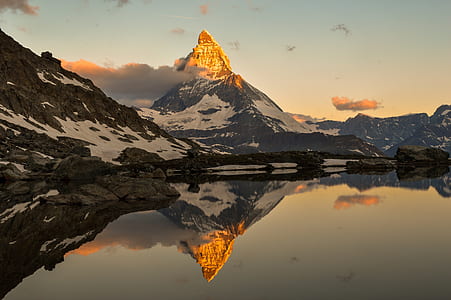 landscape photography of snow covered mountain thumbnail