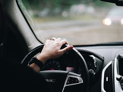 person driving GMC vehicle thumbnail