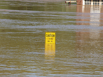 caution signage on body of water thumbnail