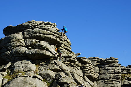 person climbing cliff thumbnail