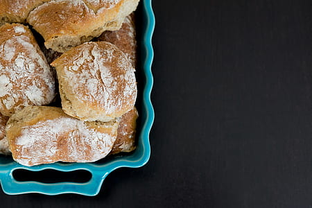 baked pastries in cyan ceramic bowl thumbnail