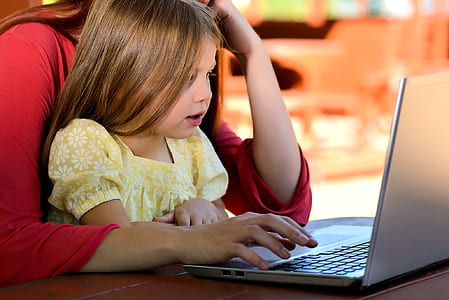 woman and child watching on laptop thumbnail