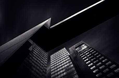 low angle of black high-rise buildings thumbnail