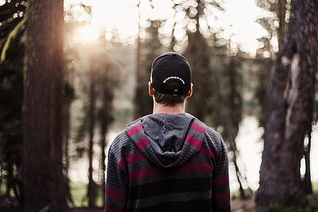 man standing in forest thumbnail