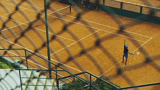 tennis player on court doing smash thumbnail