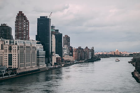Boat Between Cityscape thumbnail