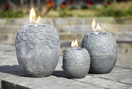 selective focus photography of vase candle holders thumbnail