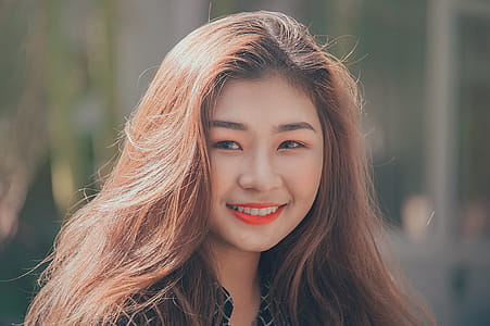 Woman Smiling Wearing Red Lipstick thumbnail