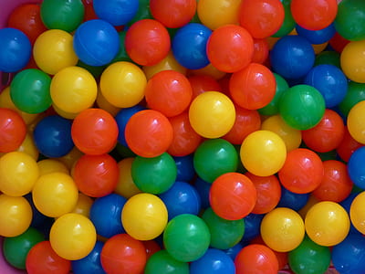 round assorted-color candies close-up photography thumbnail