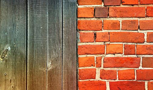 brown bricked wall beside brown wooden panel thumbnail