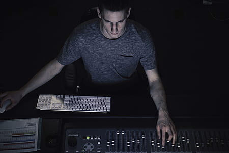 man using audio mixer indoors thumbnail