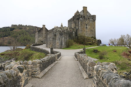 gray concrete castle on hill at daytime thumbnail