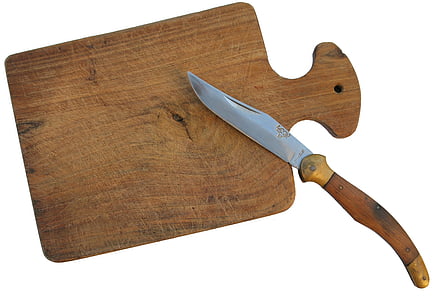 brown and grey folding knife and brown wooden chopping board thumbnail