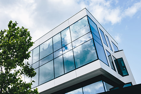 Office building windows and blue sky thumbnail