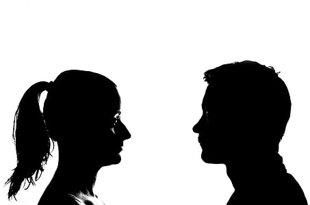 two silhouette of man facing woman thumbnail
