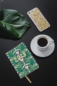 Top view of black table with 2018 calendar agenda thumbnail