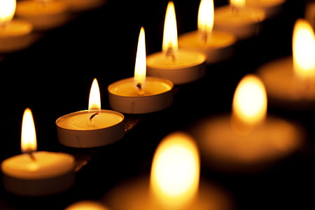 shallow focus photography of tealights thumbnail
