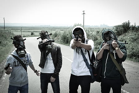 four person holding rifles thumbnail