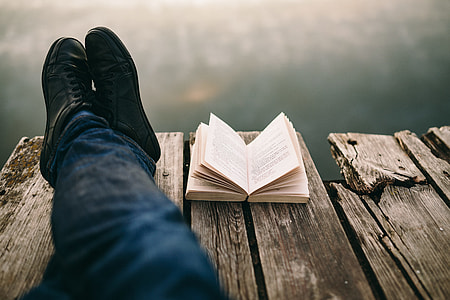 Reading book at lake thumbnail
