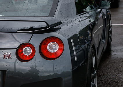 black sedan close-up photography thumbnail