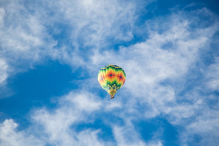 multicolored air balloon flying on sky thumbnail