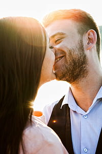 man and woman kissing each other thumbnail