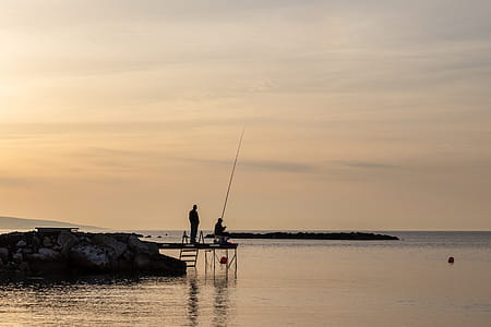Two Person Having Fishing on Dock thumbnail