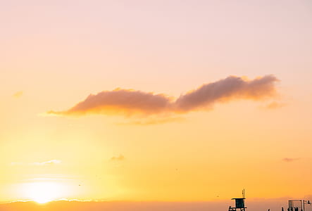 silhouette photography of house under clear sky at sunset thumbnail