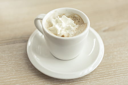 white ceramic mug on saucer thumbnail