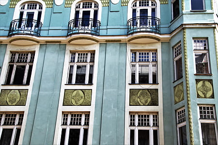 teal, white and green concrete building thumbnail