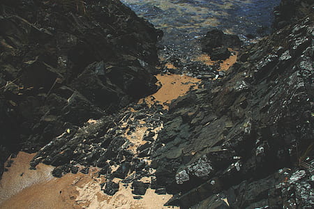 aerial photography of rocky mountain during daytime thumbnail