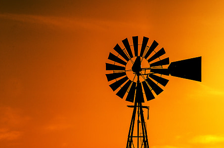 black windmill during dawn thumbnail