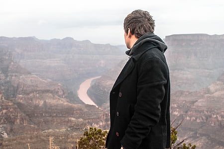 man wearing black coat thumbnail
