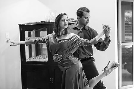 grayscale photo of man and woman dancing thumbnail