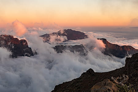 black mountain covered with fogs thumbnail