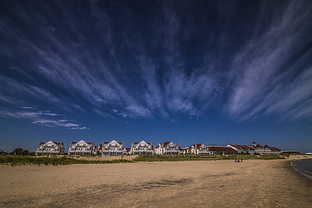 white houses near grass field thumbnail
