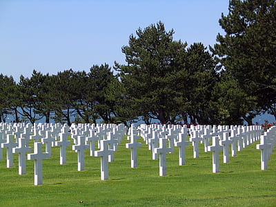 white cross tombstone lot during daytime thumbnail