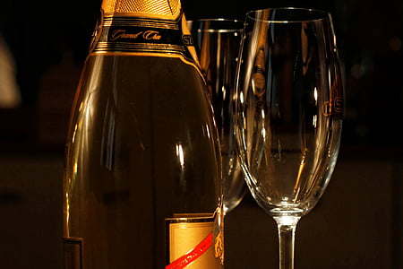 shallow focus photography of bottle an two wine glasses thumbnail