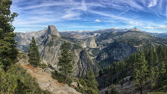 rock mountains under blue sky thumbnail