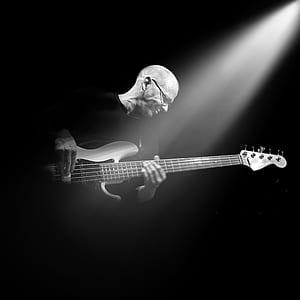 person playing electric bass guitar thumbnail