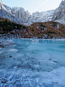 ice lake and mountains during winter thumbnail