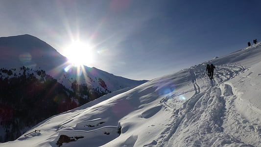 man walking on white snow thumbnail