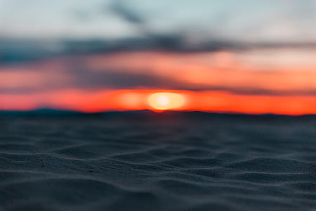 photography of sunset on beach thumbnail