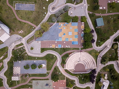 bird's eye view photography of streets and parks thumbnail