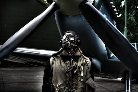 man wearing mask and suit thumbnail