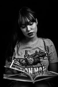 Monochrome Photography of Woman Reading Magazine thumbnail