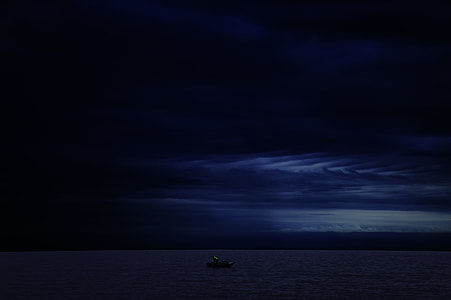 boat travelling during nighttime thumbnail