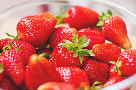 pile of strawberries in glass bowl thumbnail