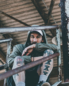 man sitting on the stair thumbnail