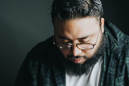 man wearing silver framed eyeglasses thumbnail